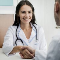 cheerful-medics-handshaking cheerful-medics-handshaking